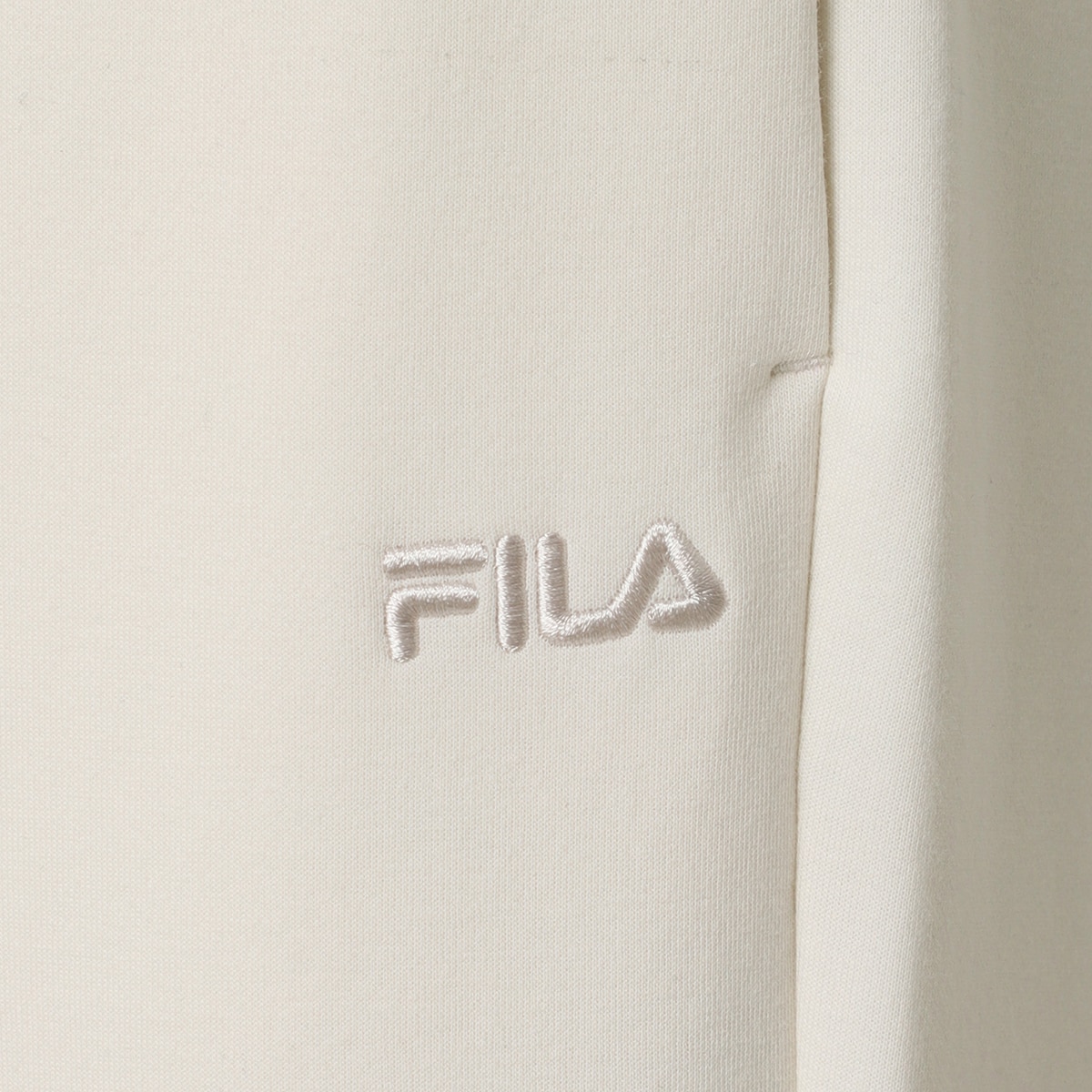 휠라 여성 스웨트 팬츠 - 아이보리, M